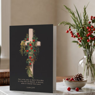 Religiöses Weihnachtskreuz und Schrift Feiertagskarte