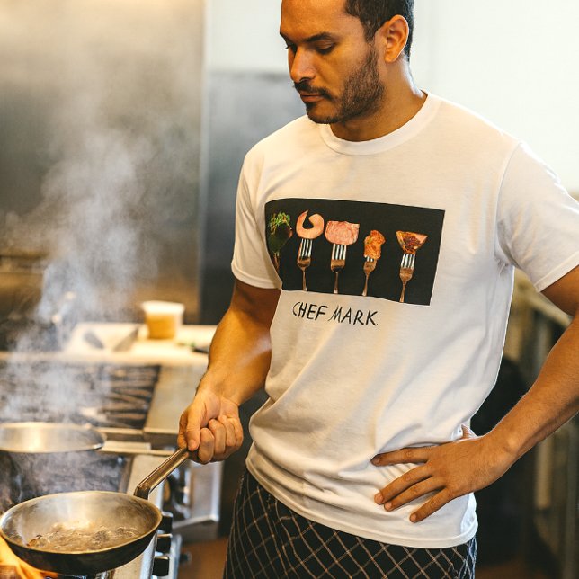 Restaurant Koch Shirt (Chef at the sauté station in bold fork-and-food tee, steam rising in a pro kitchen blaze)