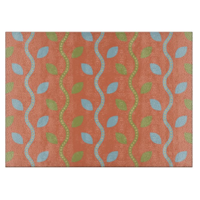 Retro Blue & Green Vines auf orangefarbenem Muster Schneidebrett (Vorderseite)