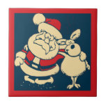 Retro Christmas Santa und sein Reindeer Buddy Fliese<br><div class="desc">Feierliche Weihnachten Weihnachten im Retro-Stil gemacht. Der Weihnachtsmann und einer seiner geliebten Rentiere,  ihre Arme um einander herum in einer freundlichen Pose.</div>