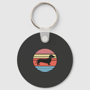 Retro-Dackel-Sonnenuntergangs-Vektor Schlüsselanhänger