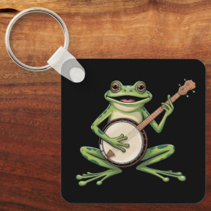 Retro-Frosch spielt Banjo 90er Musikliebhaber Vint Schlüsselanhänger