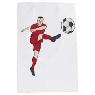 Retro-Fußballspieler tritt Ball Volley Aktion Gra Mittlere Geschenktüte