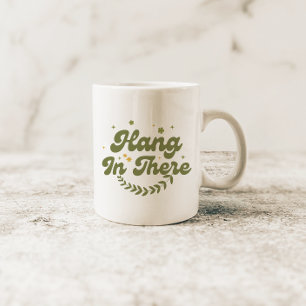 Retro-grüne Blumige 'Gib nicht auf' Zitat Kaffeetasse