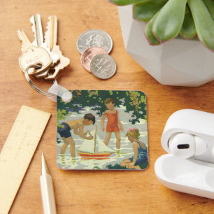 Retro Kinder spielen mit Segelbooten am Sommerteic Schlüsselanhänger