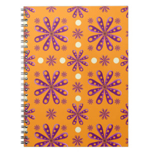 Retro-Lila-Blumen auf orangem Hintergrund Notizblock