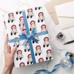 Retro-Raggedy-Ann-Puppe mit Gänseblümchen Geschenkpapier