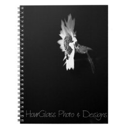 Retro-Sonnenblume mit Spiral-Notizbuchfoto einer B Notizblock