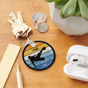 Retro-Streifen der Monogram-Silhouette Schlüsselanhänger