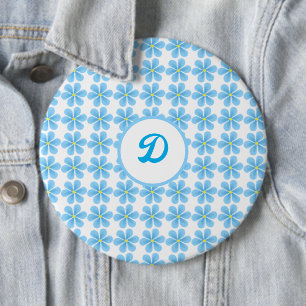 retro-trendiges vintage-blaues Blumenmonogramm Button