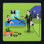 Retro-Uhr für städtische Mehrfamilienhäuser Quadratische Wanduhr<br><div class="desc">Dieses Retro Urban Cartoon Couple Wall Clock besticht durch den Cartoon eines elegant eingerichteten Penthouse Apartments mit Blick auf die Skyline der Stadt. Die Wohnung verfügt über einen grünen Fußboden und eine grüne Ziegelmauer. An der Wand sind vier klassische Movie Martini Stretched Canvas Prints, die auch im StrangeLittleOnion's Zazzle Store...</div>