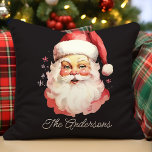 Retro Vintag Santa Claus Black Christmas Kissen<br><div class="desc">Fügen Sie eine nostalgische Touch zu Ihrem Urlaubsstil mit diesem personalisierten Retro Santa Claus Kissen werfen. Dieses Kissen mit einem klassischen, Vintagen Santa-Design auf schwarzem Hintergrund ist ideal, um Ihren Zuhause einen angenehmen Urlaub zu bereiten. Passen Sie es mit Ihrem Familiennamen an für einen einzigartigen Weihnachtsakzent, der die Wärme und...</div>