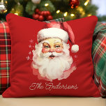 Retro Vintag Santa Claus Red Christmas Kissen<br><div class="desc">Fügen Sie eine nostalgische Touch zu Ihrem Urlaubsstil mit diesem personalisierten Retro Santa Claus Kissen werfen. Dieses Kissen mit einem klassischen, Vintagen Santa-Design auf rotem Hintergrund ist ideal, um Ihren Zuhause einen angenehmen Urlaub zu bereiten. Passen Sie es mit Ihrem Familiennamen an für einen einzigartigen Weihnachtsakzent, der die Wärme und...</div>