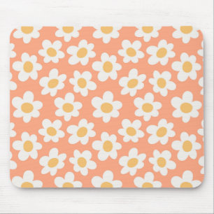 Retrostil blüht auf orangefarbenem Hintergrund Mousepad