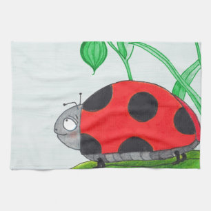 Riesiger roter Marienkäfer auf einem Blatt Geschirrtuch