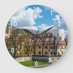Riga Burg bei Sonnenaufgang in Riga, Lettland Große Wanduhr