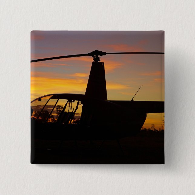 Robinson R44 Hubschrauber bei Sonnenuntergang Button (Vorderseite)