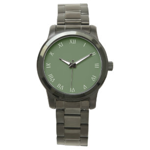 Rom-Zahlen mit weißer Schrift auf grünen Frauen  Armbanduhr