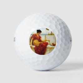 Roman Frau spielt mit ihrer Lieblingskatze Golfball