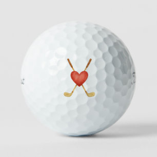 Romantische Crossed Golf Clubs hinter einer Heart Golfball