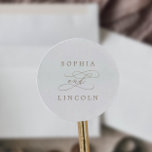 Romantische Goldkalligrafie-Hochzeiten-Umschlag Au Runder Aufkleber<br><div class="desc">Diese romantischen Umschlag Aufkleber mit Goldkalligrafie sind perfekt für eine Hochzeit. Das moderne klassische Design besticht durch extravagante Wirbel und skurrile Schnörkel mit herrlich eleganten, handgezeichneten Imitaten, die auf Champagner-Goldfolie-Typografie setzen. Personalisieren Sie das Etikett mit den Namen der Braut und des Bräutigams. Bitte beachten Sie: Dieses Design enthält keine echte...</div>