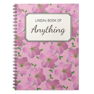 Romantische rosa Blumen auf irgendeiner Farbe Notizblock