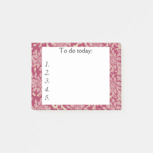 Rosa Blume am roten Post Hinweis Post-it Klebezettel