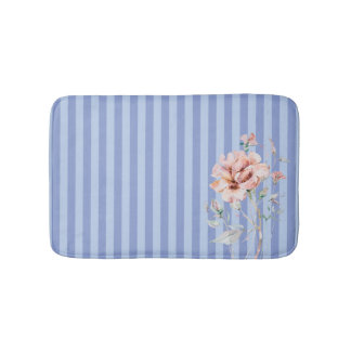 Rosa Blume auf blauem Streifen Badematte