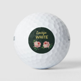 Rosa Blume und Blätter auf dunkelgrün Golfball