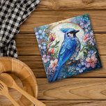Rosa Blumenblauer Jay-Bird-Gläser Fliese<br><div class="desc">Auf dieser Keramik sitzt eine wunderschöne blaue Jay in einem hellen Himmelskreis. Der Kreis und der Vogel sind umgeben und überlagert mit pastellblauen,  rosa und orangefarbenen Blume und Knospen. Ein Overlay wurde hinzugefügt,  um ein farbiges Glas zu erhalten. Hübsch!</div>