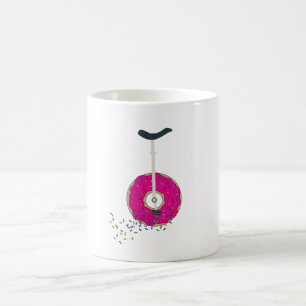 Rosa Donut Wheel Einrad mit farbenfrohen Sprinklen Kaffeetasse