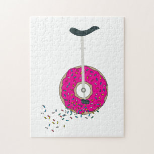 Rosa Donut Wheel Einrad mit farbenfrohen Sprinklen Puzzle