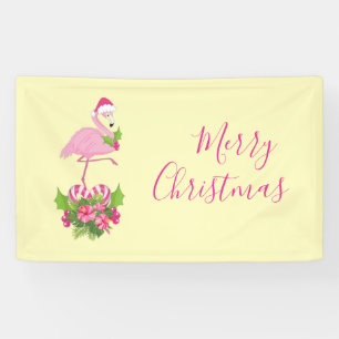 Rosa Flamingo in Weihnachtsmannmütze mit Candy Can Banner