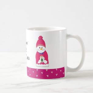 Rosa Frostschneemann mit heißer Schokolade Tasse