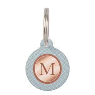 Rosa-Gold-ähnliches Monogramm auf bläulichem Grau Tiermarke