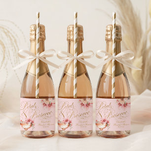 Rosa Goldene Blütenblätter und Prosecco-Junggesell