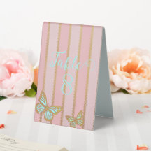 Rosa goldene Streifen und Schmetterling