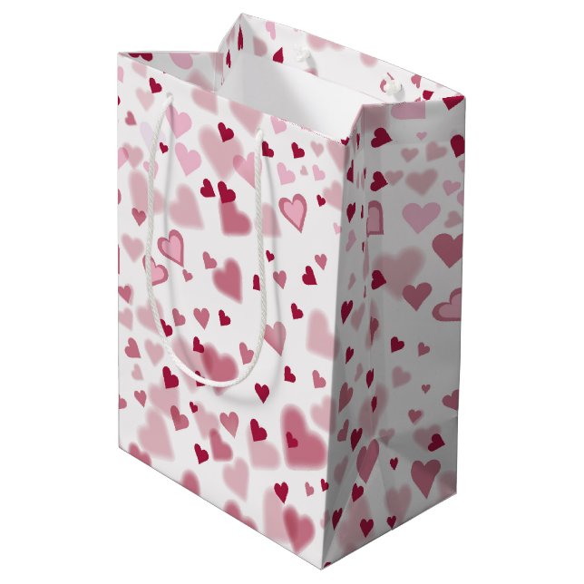 Rosa Herzchen Muster Mittlere Geschenktüte (Rückseite Schrägansicht)