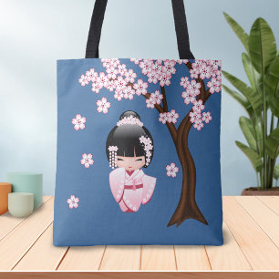 Rosa Kimono Kawaii Kokeshi-Puppe auf Blau