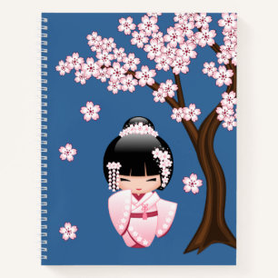 Rosa Kimono Kawaii Kokeshi-Puppe auf Blau Notizbuch