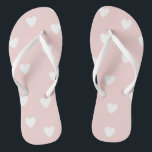 Rosa mit weißem Herzen Flip Flops<br><div class="desc">NewParkLane - Flip Flops,  mit einem niedlichen Handmuster kleine weiße Herzen gezeichnet. Ein niedliches Design für Mädchen oder für eine Hochzeit am Strand. Karo diese Auflistung für passende Elemente aus. Auch in heißen rosa erhältlich.</div>