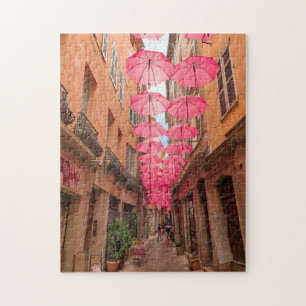 Rosa Regenschirme in Grasse, Französische Riviera, Puzzle