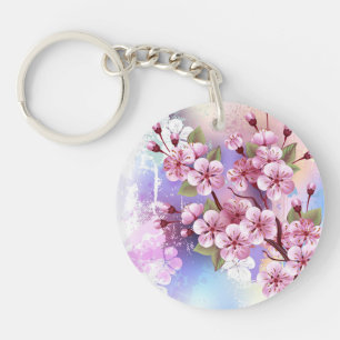Rosa Sakura auf dem Hintergrund der Malerei Schlüsselanhänger