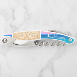 Rosa Sonnenuntergangsherzen in der Hochzeit am San Kellnermesser