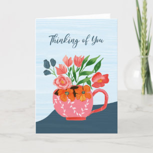 Rosa Tasse mit Blume Denken Sie an Ihre Karte