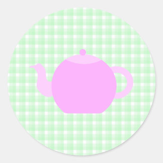 Rosa Teekanne Design auf grünem Karo. Runder Aufkleber