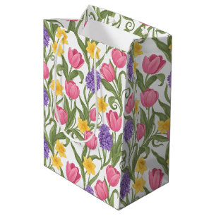 Rosa Tulpen, gelbe Narzissen, violette Hyazinthen Mittlere Geschenktüte