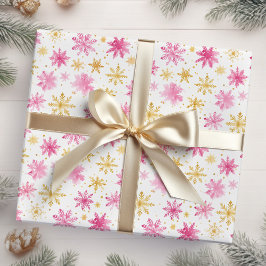 Rosa und goldene Weihnachtsschneeflocken Geschenkpapier