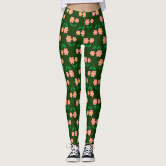 Rosa und orangefarbene Blütendrucke in grüner Farb Leggings