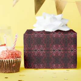 Rosa und rote Punkte und Schlängelchen-Muster auf Geschenkpapier